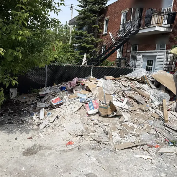 Before: Renovation debris in a Montréal backyard, then a cleared lot.